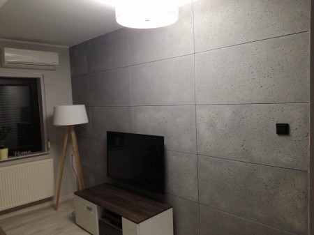 Płyta betonowa ultra lekka porowata jasny popiel - struktura porowata - realizacje